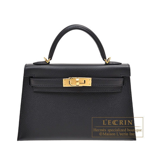 A BLACK OSTRICH MINI SELLIER KELLY 20 WITH GOLD HARDWARE