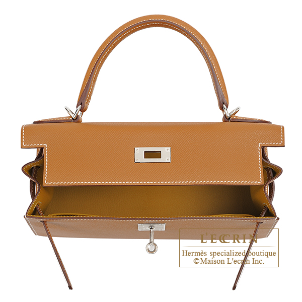 Missfazura carried H kelly pochette apricot ostrich leather with